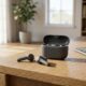 Wireless earbuds and charging case representing the best budget earbuds under $50