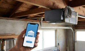 Smart garage controller mounted on a garage door opener, one of the best smart garage controllers for retrofitting older garages