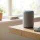 Smart speaker and smartphone illustrating voice assistant eavesdropping risks in a home setting